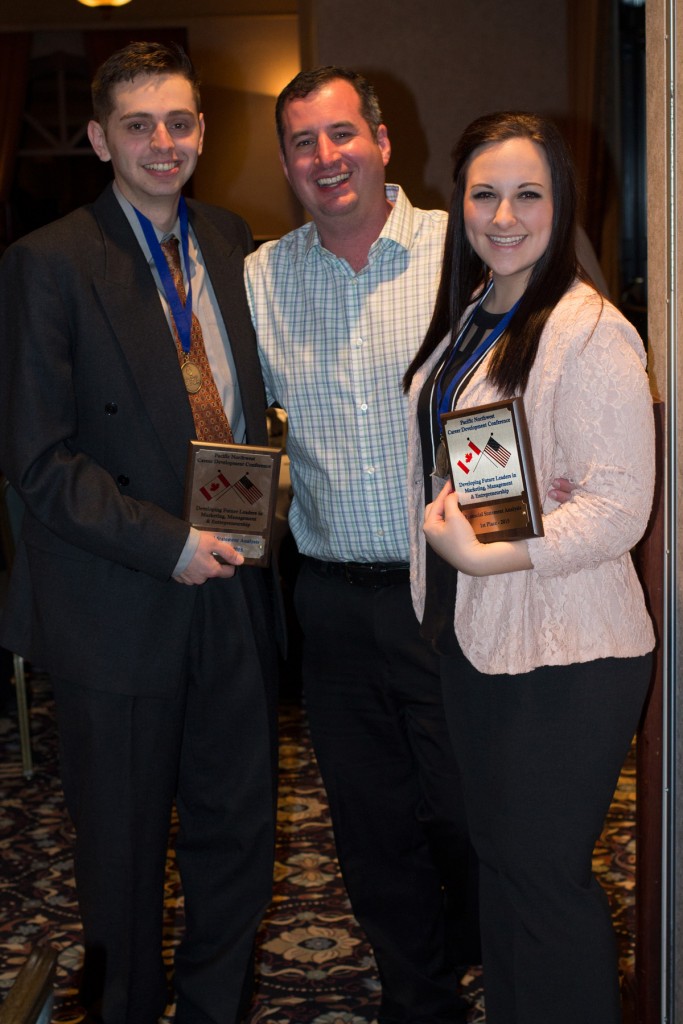 Bellevue DECA students Keith Monaghan and Olivia Wright win the Washington state championship in Financial Statement Analysis