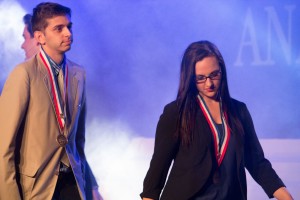 Keith Monaghan and Olivia Wright of Bellevue DECA receive their awardd for Finalists in Financial Statement Analysis, presented at the Collegiate DECA 2015 ICDC