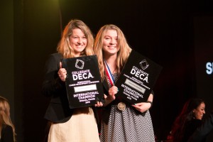 Tana Rulkova and Susan Petris of Bellevue DECA receive their 2015 National Championship awards in International Marketing, presented at the Collegiate DECA ICDC